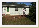 DCP_1180 * Lars is raking up some of the needles * 360 x 240 * (13KB)